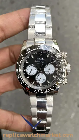 Replika Rolex Cosmograph Daytona 126529LN — Le Mans Siyah Kadran 40 mm — ürün görünümü 1