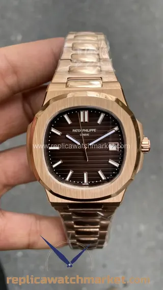 Replika Patek Philippe Nautilus 5711 — Pembe altın kasa, çikolata kahverengi kadran 40 mm — ürün görünümü 1