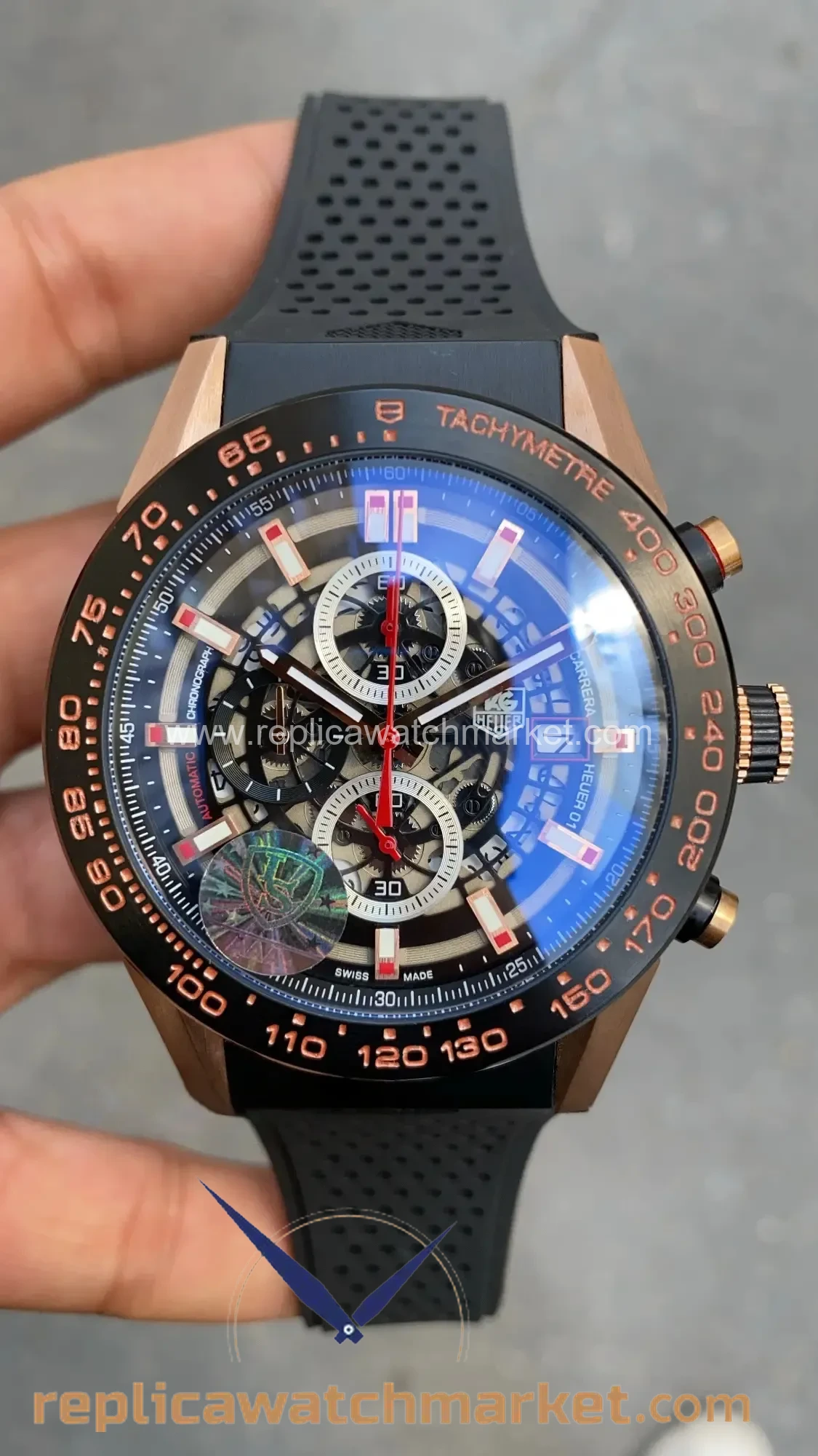 Replica TAG Heuer Carrera Calibre Heuer 01 Skeleton Chronograph — Rose Gold Case Black Dial Rubber Strap 43 mm — product view 1